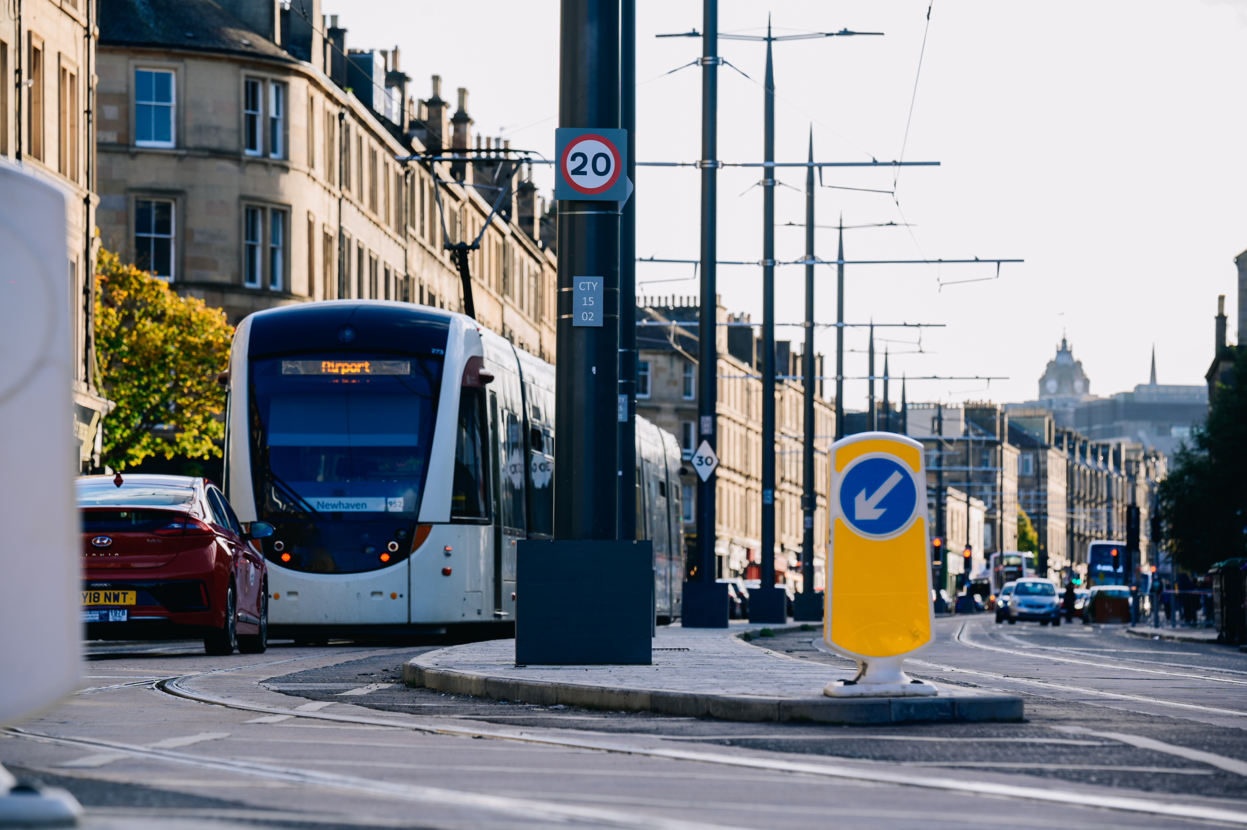Cars, buses and trams in Edinburgh. Photo by Ben Glasgow Photography.