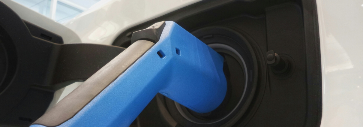 An electric HGV being charged.