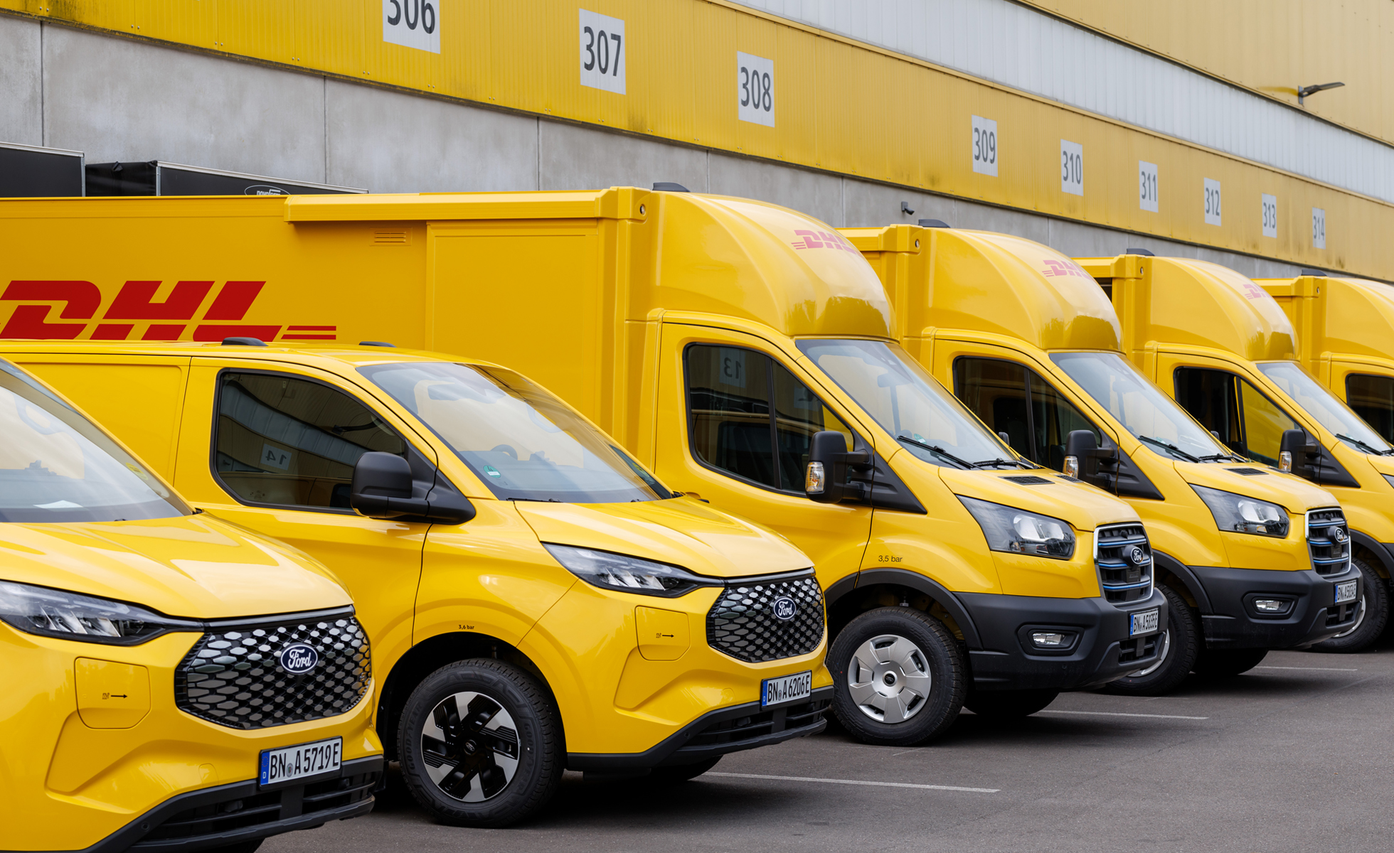 Electric Ford E-Transit vans at a DHL depot. Image courtesy of DHL. 