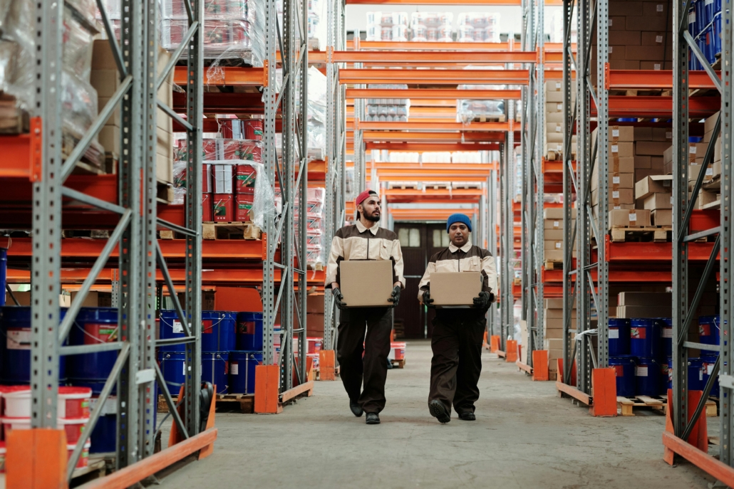 Workers in a warehouse. Photo by Tiger Lily on Pexels.