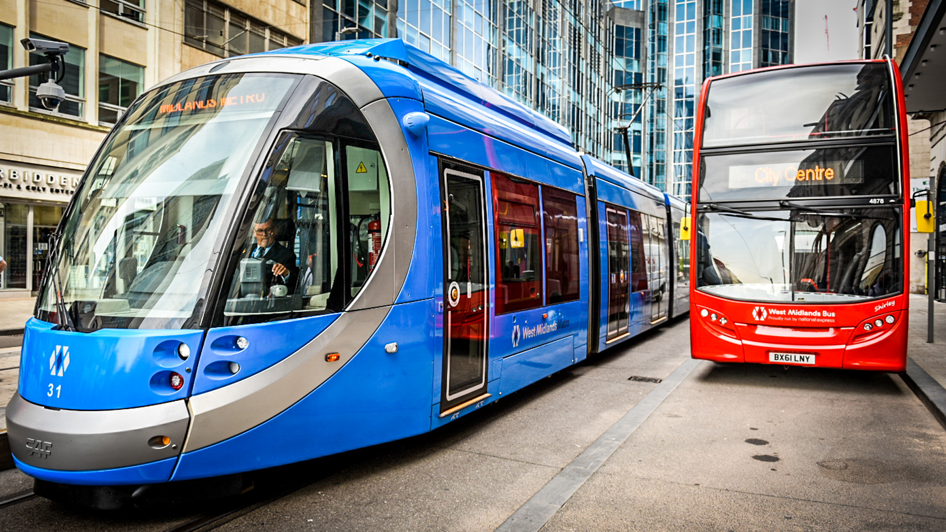 A West Midlands tram and bus. Photo by Transport for West Midlands / West Midlands Combined Authority.