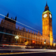 Traffic on Westminster Bridge passing Big Ben in London.