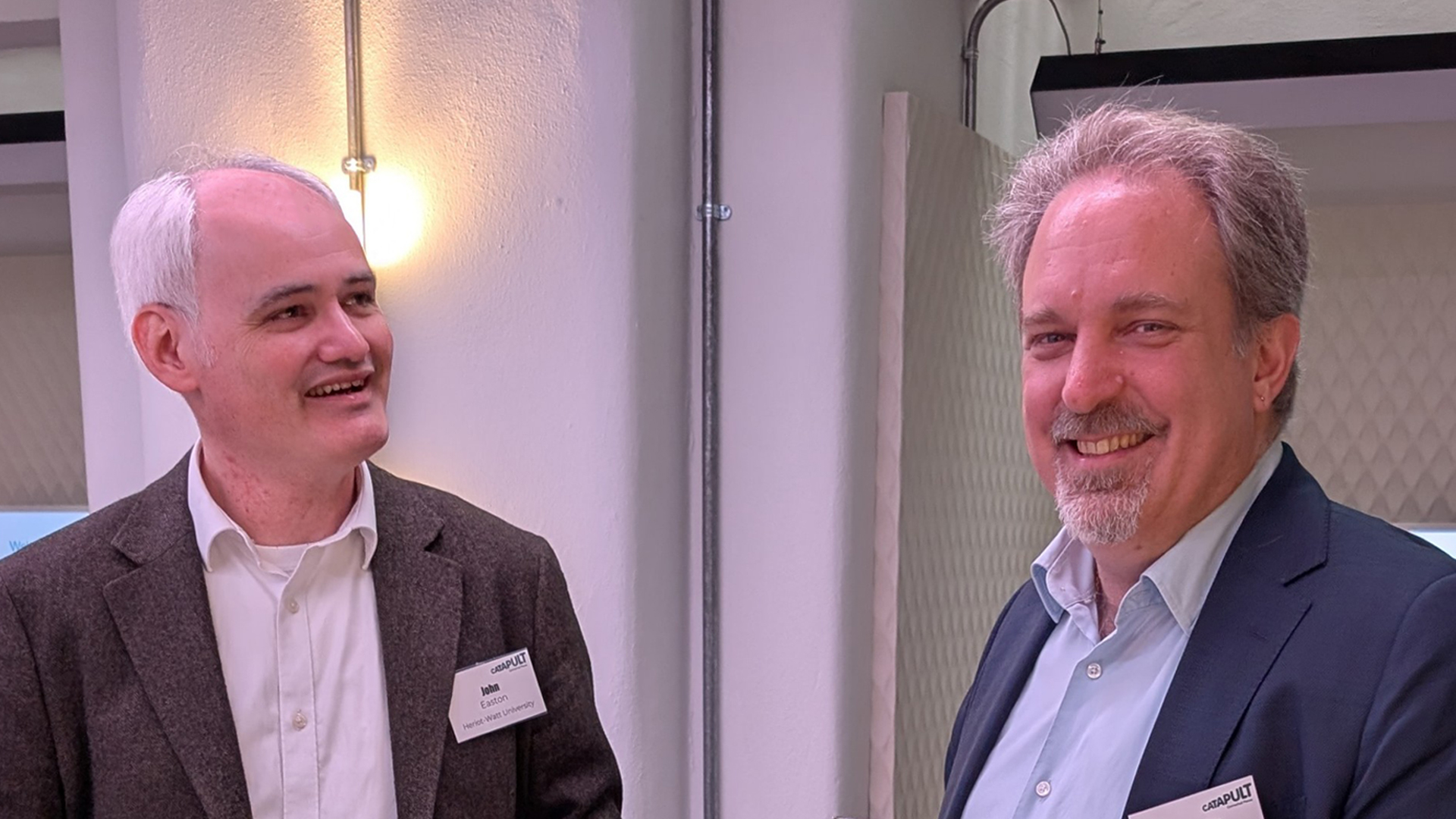 TransiT Co-Investigators Professor Dimitrios Pezaros and Professor John Easton at the cybersecurity event.