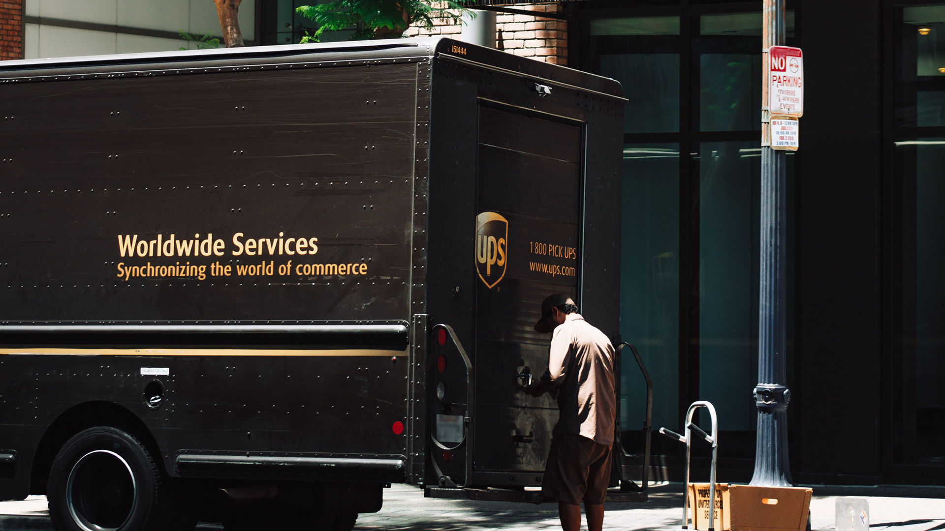 A city delivery courier. Photo by Thom Gonzalez on Pexels.