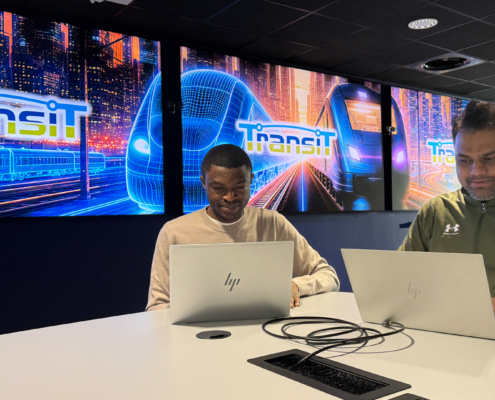 TransiT research students Yakubu Isah (left) and Mustafeez Khanzada in the research hub’s Transport Intelligence Lab.
